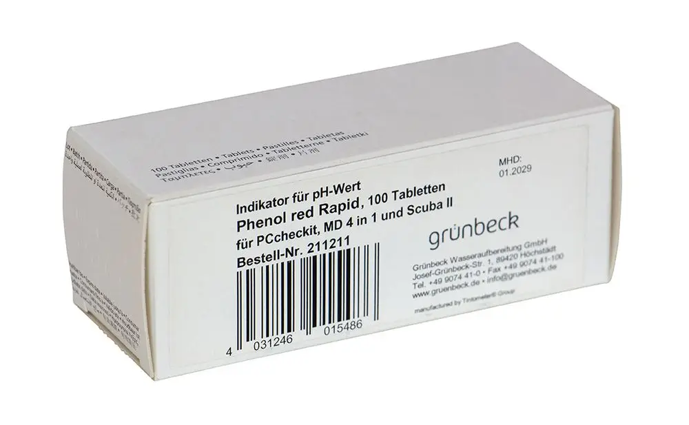 Weißer Karton mit Informationen zu einem pH-Indikator in Tablettenform von Grünbeck, einschließlich Barcode und Haltbarkeitsdatum, für die Wasseranalyse.